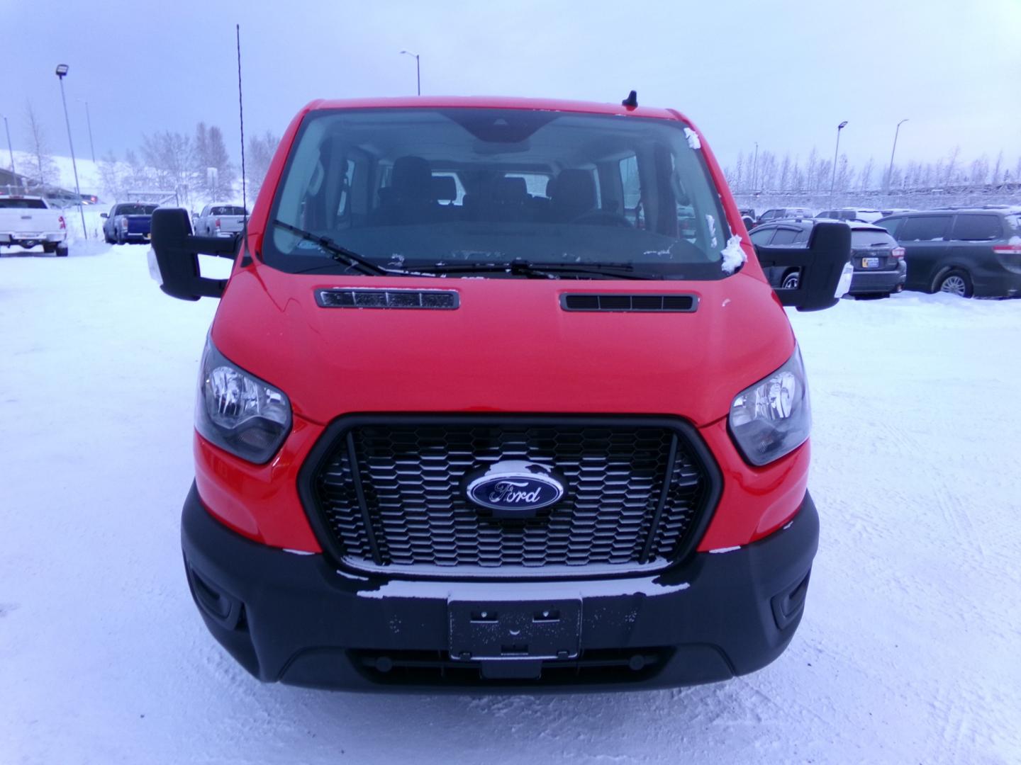 2021 Red Ford Transit (1FBAX9Y89MK) with an 3.5L V6 DOHC 24V engine, 6-Speed Automatic transmission, located at 2630 Philips Field Rd., Fairbanks, AK, 99709, (907) 458-0593, 64.848068, -147.780609 - Photo#1